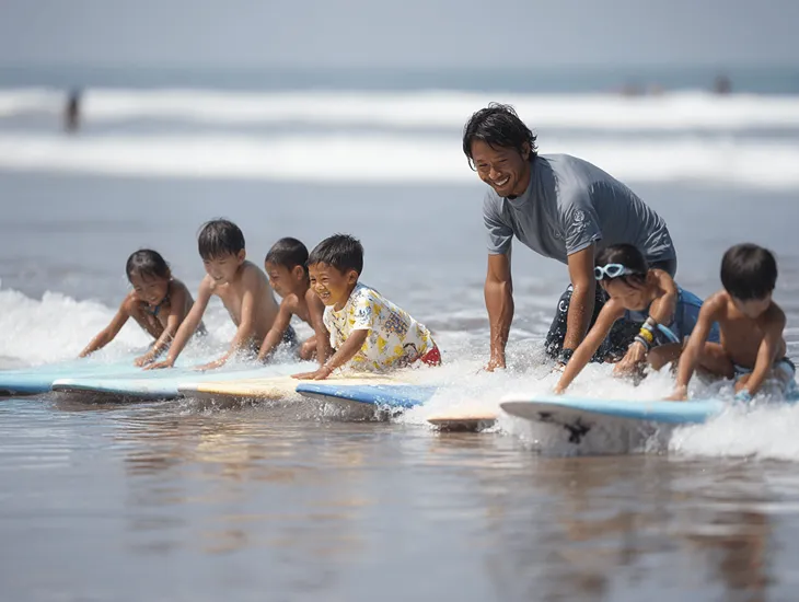 Surf Lessons for Kids 2026 – Soft top surfboards, supervised whitewater lessons, and comprehensive ocean safety briefings.