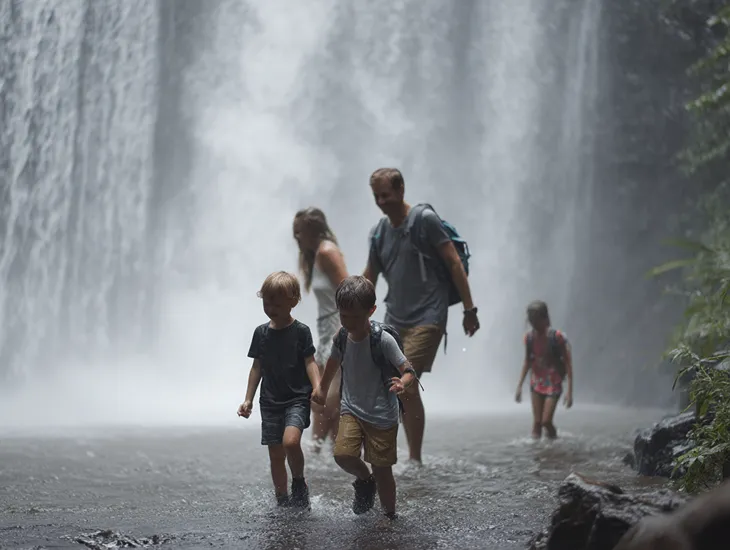 Waterfall Exploration 2026 – Safe river wading areas, family photo opportunities, and age-appropriate exploration activities for children in Indonesia.