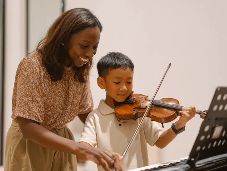 In-Villa Music Safety 2026 – A safe and organized practice space featuring a music stand, proper lighting, and secured instrument cables