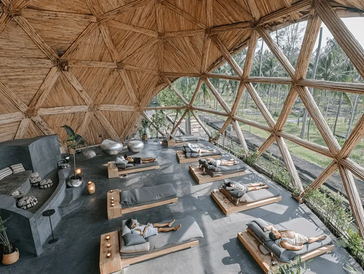 Holistic therapy in Indonesia 2026 – A professional babysitter waiting outside the sound dome safely.