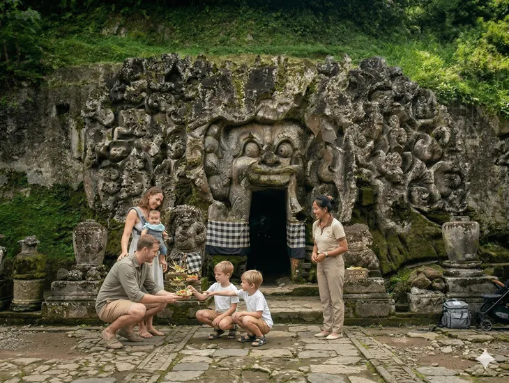 Ancient Site in Indonesia 2026 – A professional babysitter in Indonesia helping children explore a 9th-century cave temple.
