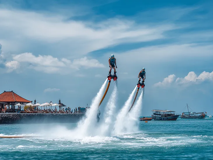 Watersports in Bali 2026 – Certified instructors monitoring hydro-flight safety gear and life jackets for international families.