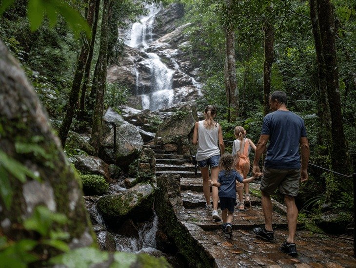 Kid-friendly hiking in Bali 2026 – A modified 4x4 jeep parked on a volcanic ash trail at sunrise with a family inside.