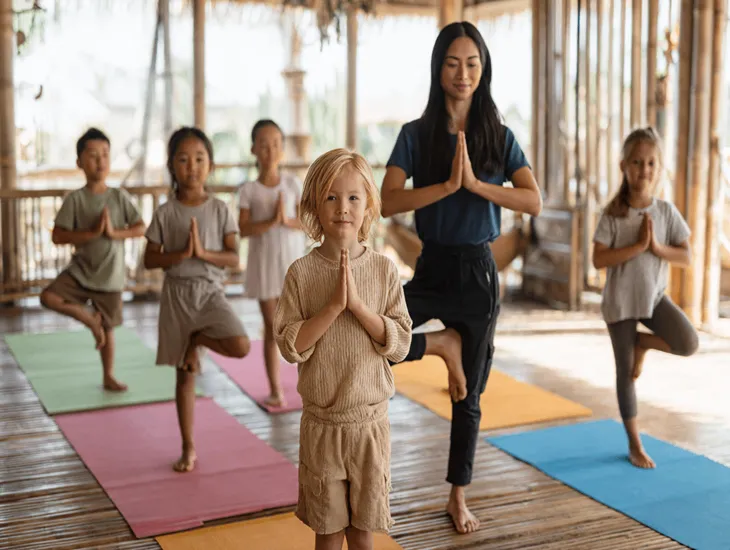 Kids’ Yoga Standards 2026 – Age-appropriate asana stories, mindfulness game requirements, and teacher certification for family studios in Bali.