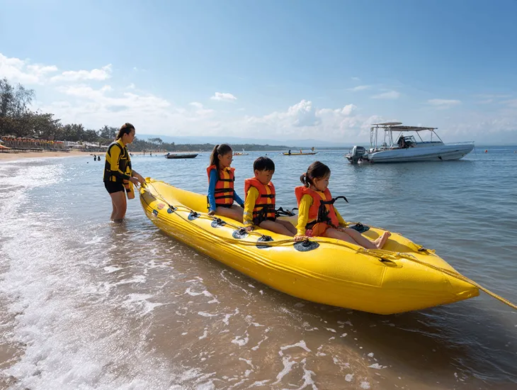 Kid-Friendly Beaches in Bali at Tanjung Benoa with calm waters, banana boat rides, and supervised family water sports