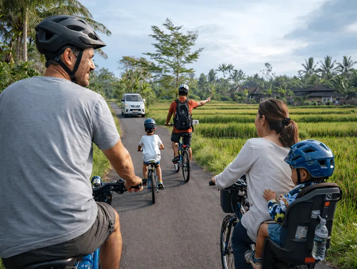 Eco Cycling In Bali 2026 – Safety equipment, mountain bikes, and child seats for family touring