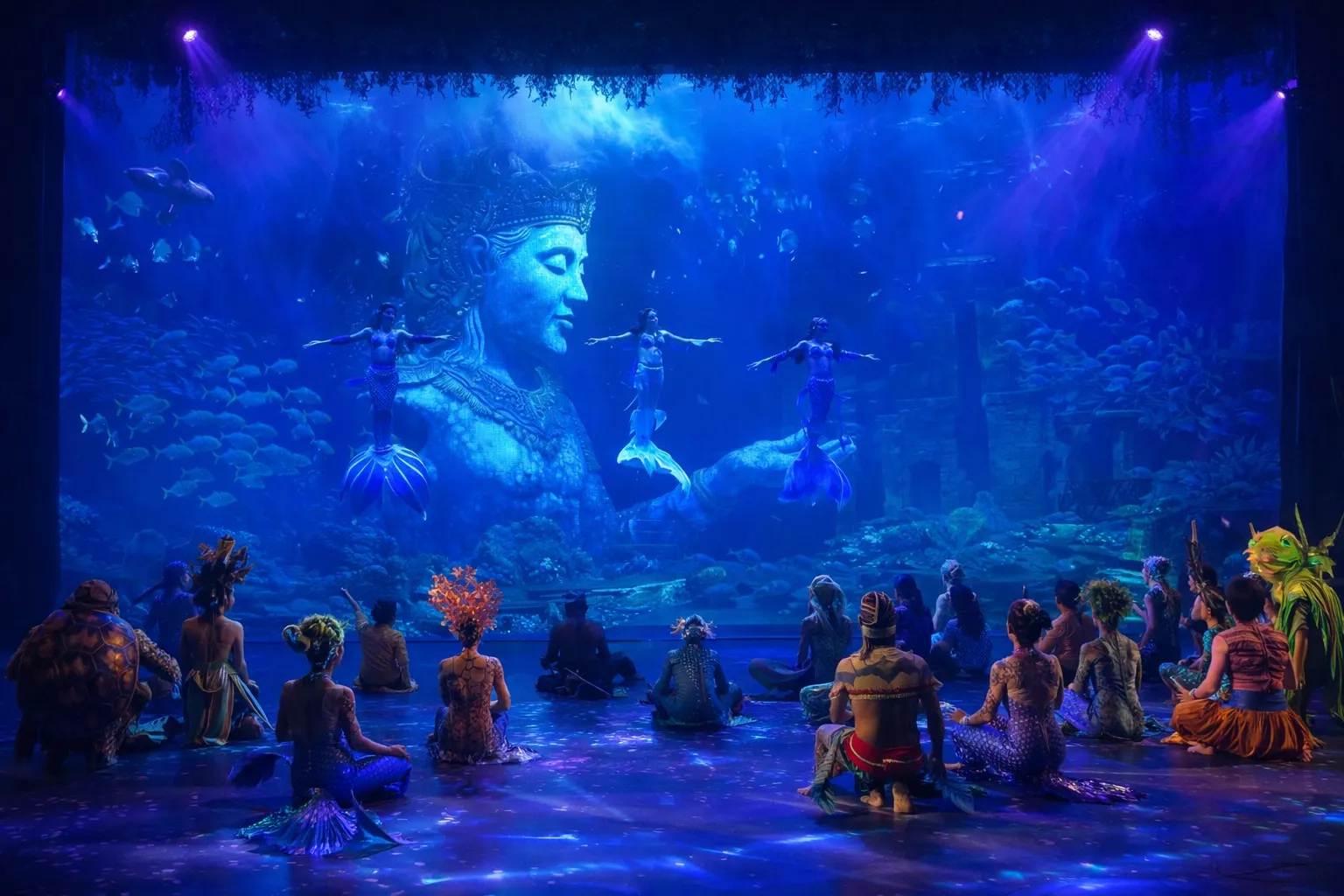 Gianyar Family Activities 2026 – Childcare professional managing theater seating and etiquette for young children.