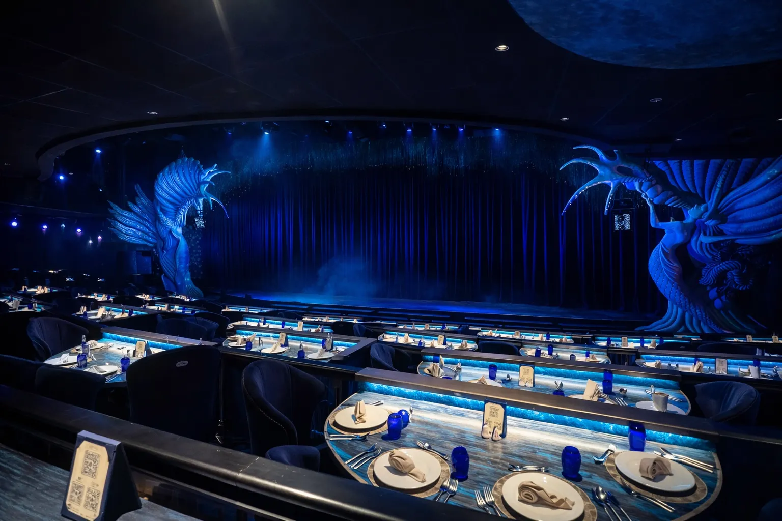 Varuna Show Safety 2026 – Childcare professional escorting a child quietly to the restroom during a theater performance.