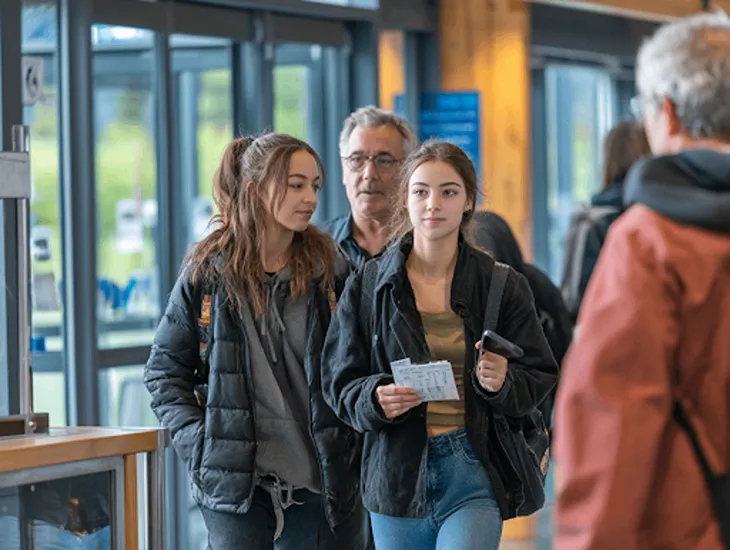 Museum Pasifika 2026 – A professional babysitter supervising a teenager during a quiet art gallery tour in Nusa Dua