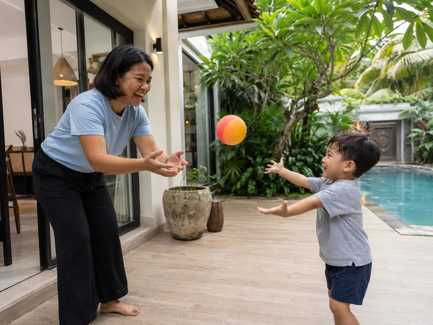 Trial Babysitter in Indonesia 2026 – Vetted professional caregiver playing safely with a toddler