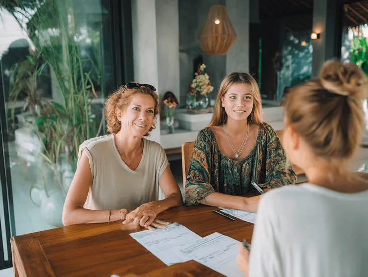 Maid and Babysitter Costs in Bali 2026 – Caregiver preparing healthy snacks and engaging toddlers safely