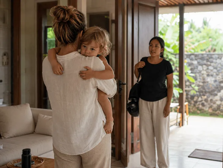 Always-Late Babysitter in Bali 2026 – Foreign mom checking her watch while waiting for childcare help