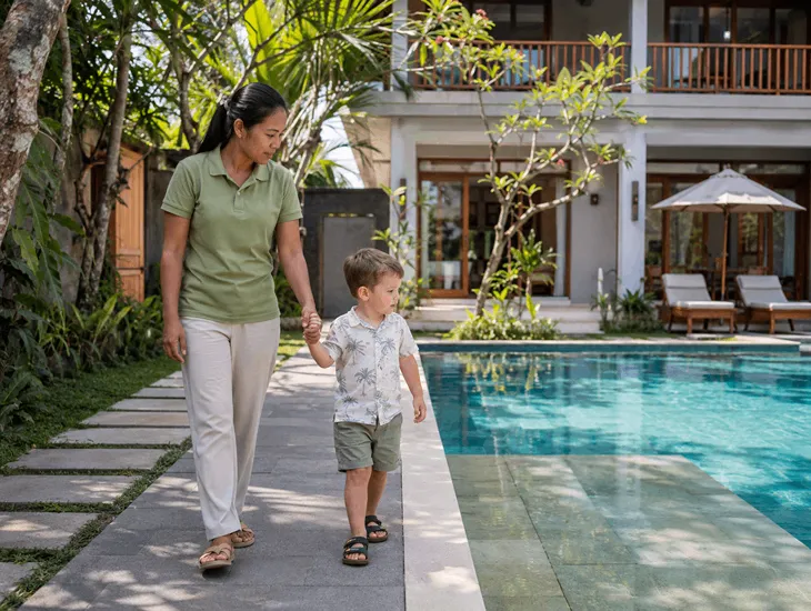Babysitter in Bali 2026. Childcare professional conducting identity verification and safety checks for a new client.