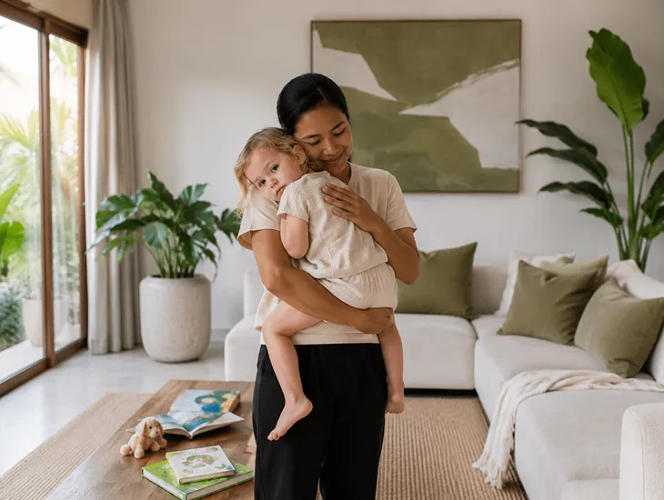 Backup Sitter Services in Bali 2026 – Professional caregiver comforting a toddler in a modern villa