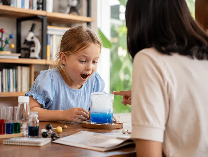 Hiring Tutors for Kids in Bali 2026 – Qualified teacher conducting an engaging science experiment