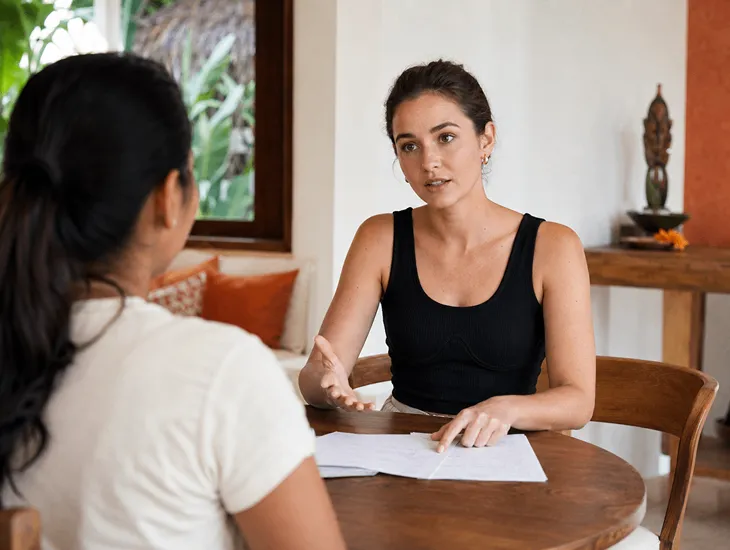 Childcare Safety Guidelines 2026 – Concerned parent observing an unengaged babysitter in Indonesia